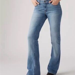 Levi's women’s 590 Classic Bootcut Jeans~ blue hue.